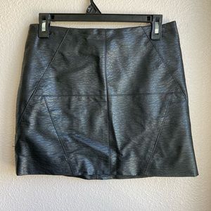 Black leather mini skirt